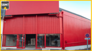 remise en peinture par système électrostatique sur site d'un bardage métal de magasin